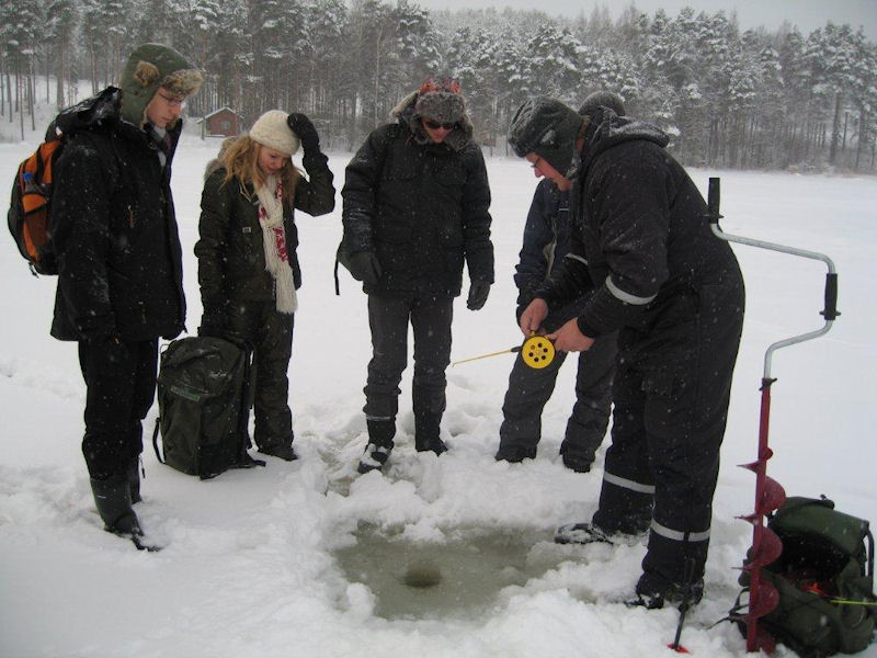 Topi teaching ice fishing